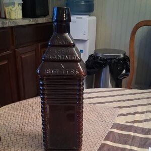 Drake Vintage Brown Glass Art Bottle